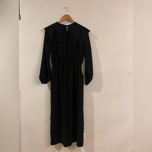 Black long sleeve excellent condition jumpsuit from Wilfred